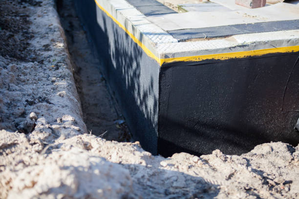 Professional Waterproofing technician working in Green Valley, WI